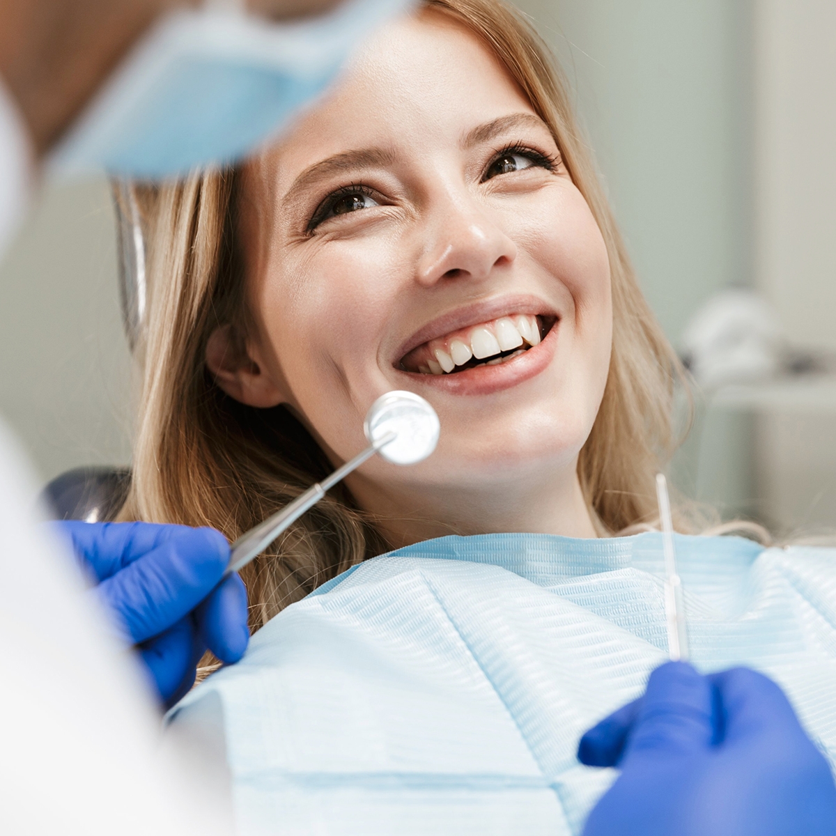 woman smiling at dentist